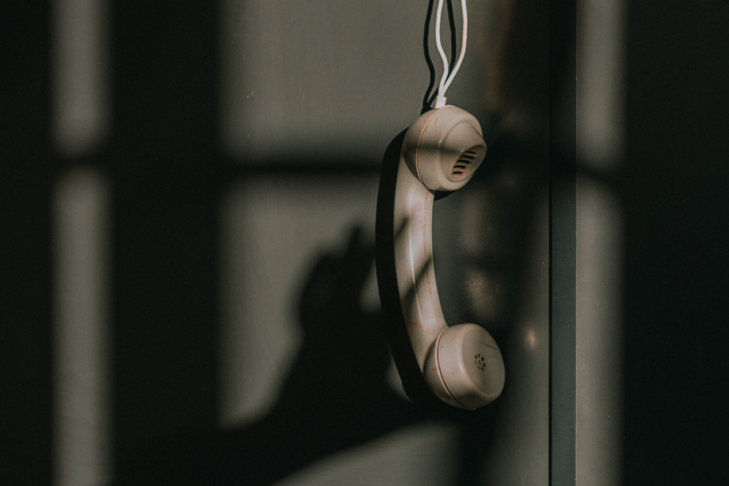 a phone hanging off the hook