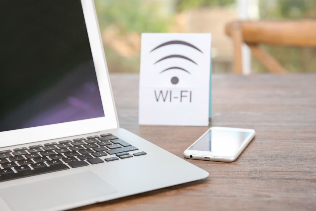 free wifi sign next to a laptop