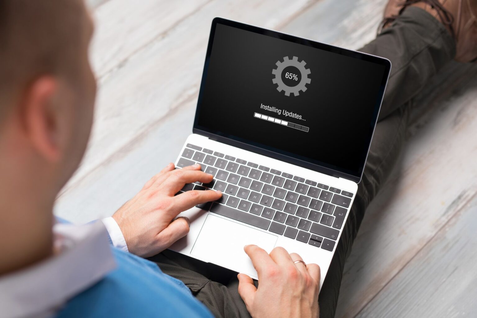 a laptop screen showing an update loading